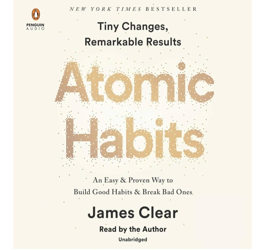 Book cover for 'Atomic Habits' by James Clear; beige background with dotted orange typography and 'Penguin Audio' logo in corner.